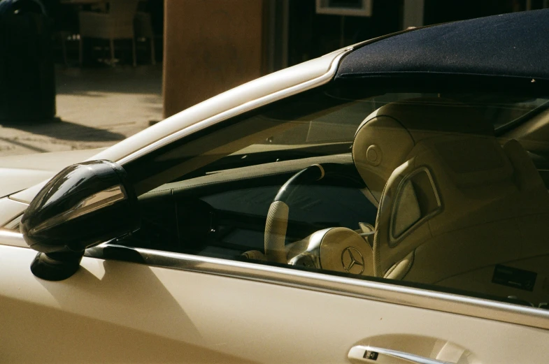 a close up view of a car and the side mirror