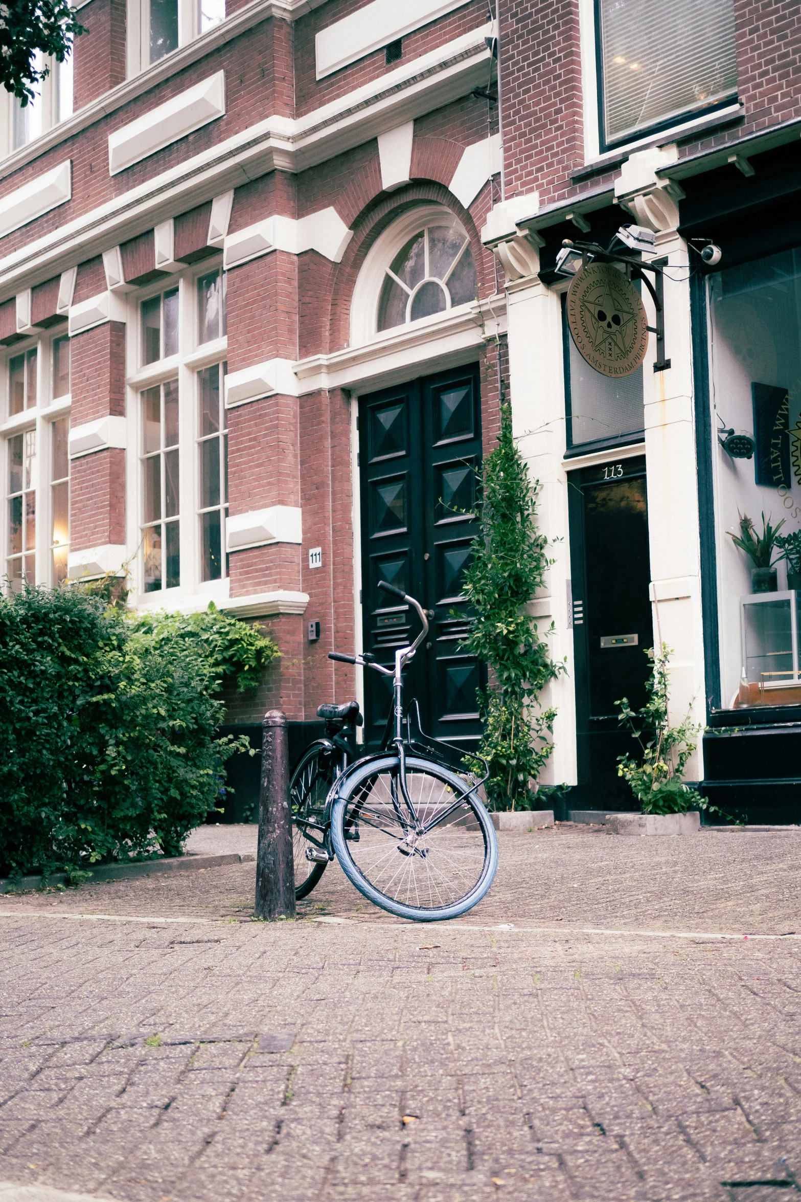 a bicycle parked outside of a building