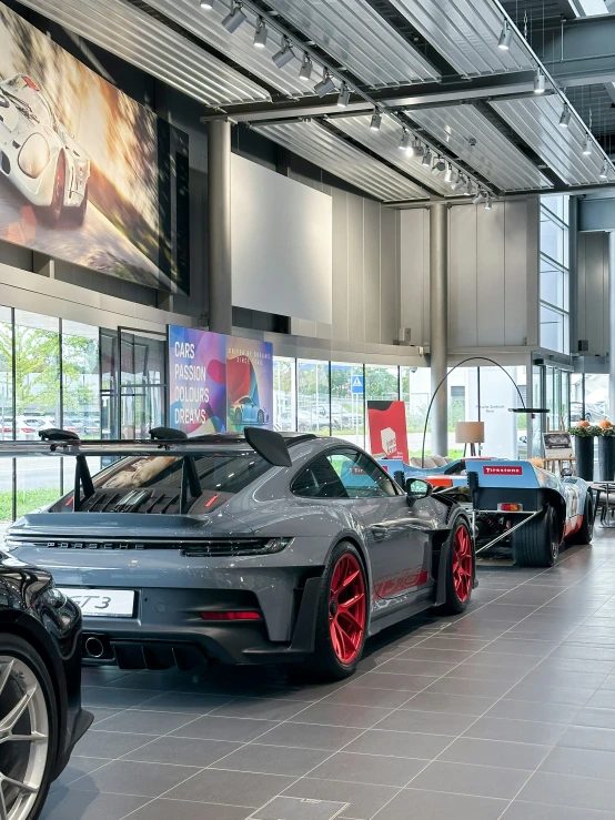 the two cars in the show room are very unique