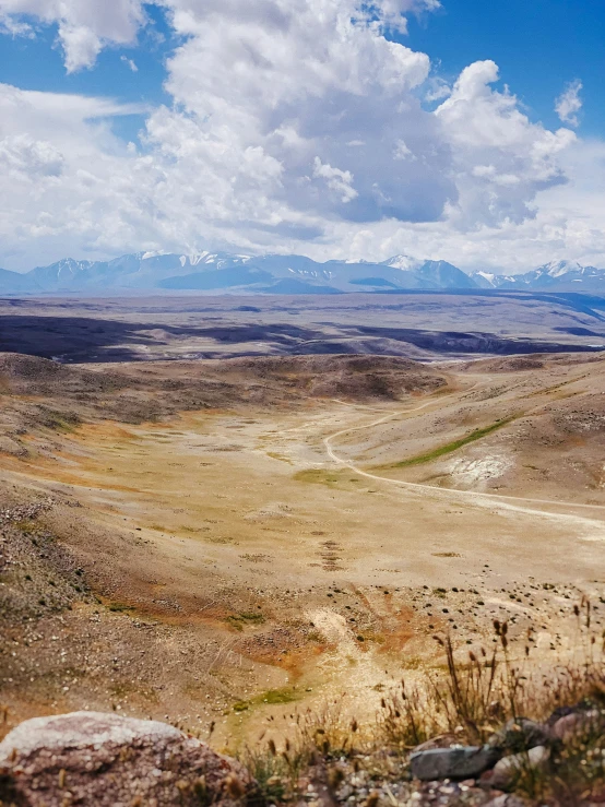 some very big pretty mountains with snow capped peaks