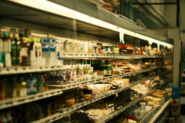 a large grocery store filled with shelves filled with food