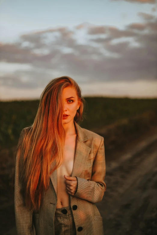 an image of a woman with big  and red hair