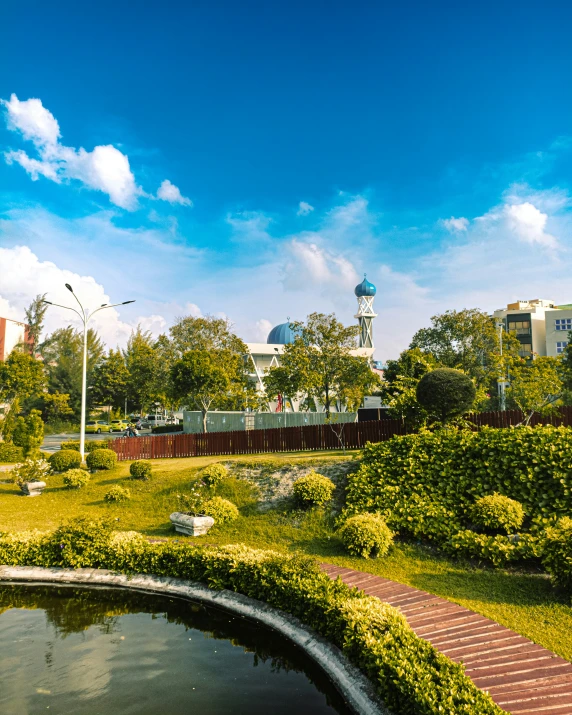 the park is very attractive, with the clock tower in the background