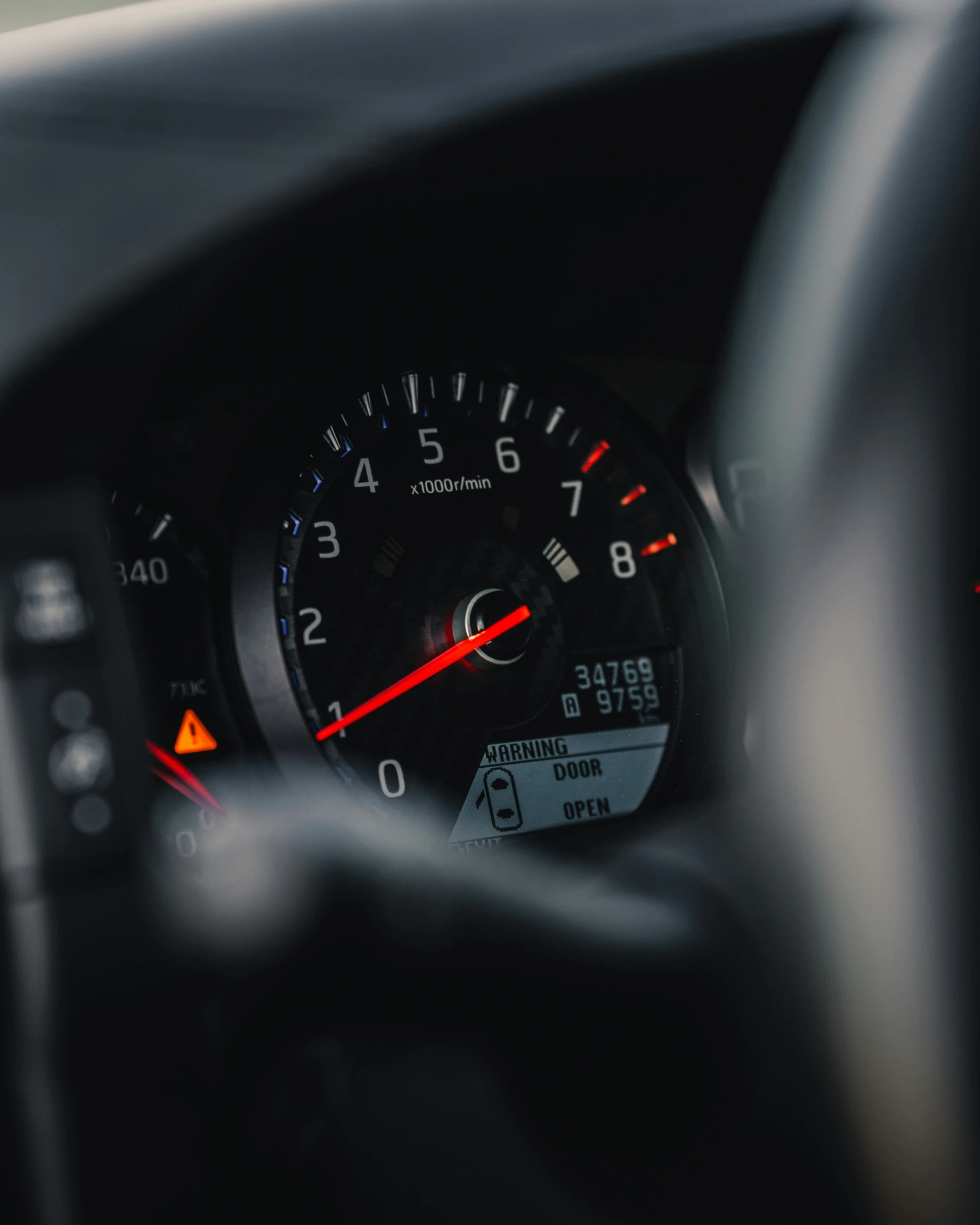 a close up view of a dashboard with meters