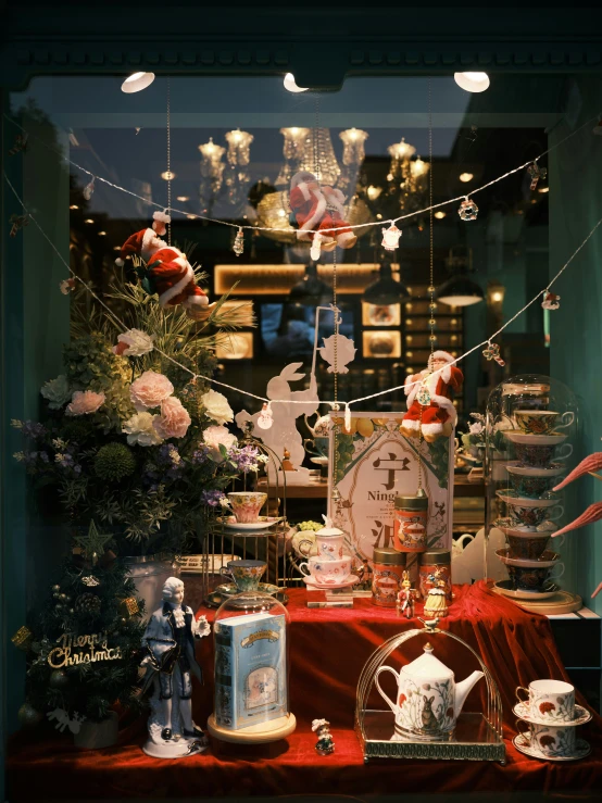the window has a variety of decorated items on display
