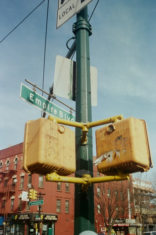 suitcases are on the street post near an intersection