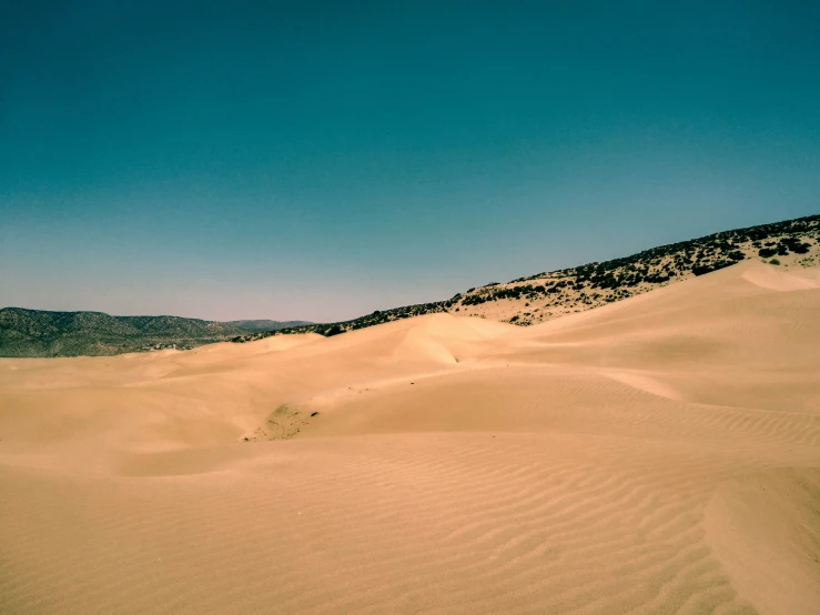 some very big pretty sand dunes in the desert