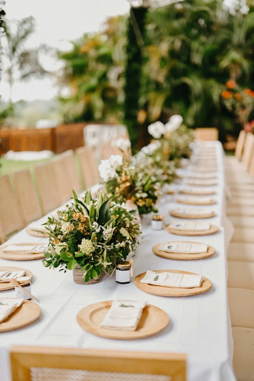 a wedding reception table with place setting