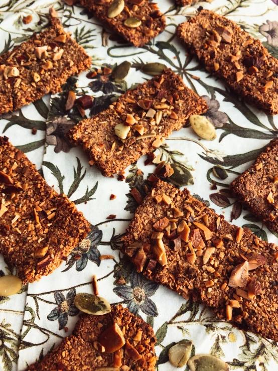 a plate full of cookies with almonds on it