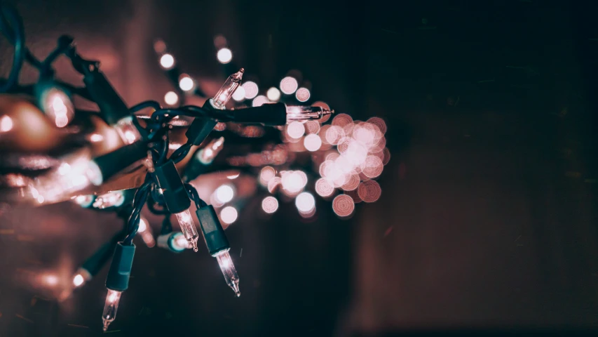 christmas lights are connected together on a small stick