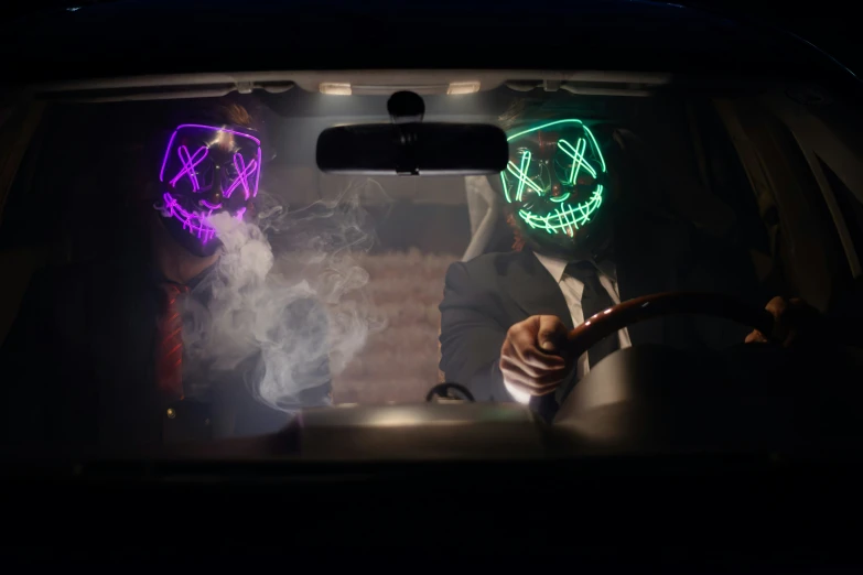 two skully glowing masks are shown behind the passenger seat