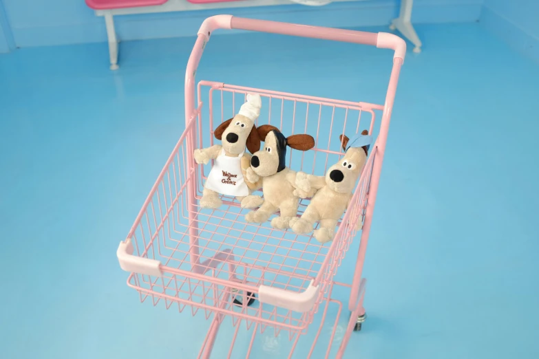 there are some toy stuffed dogs in the trolley