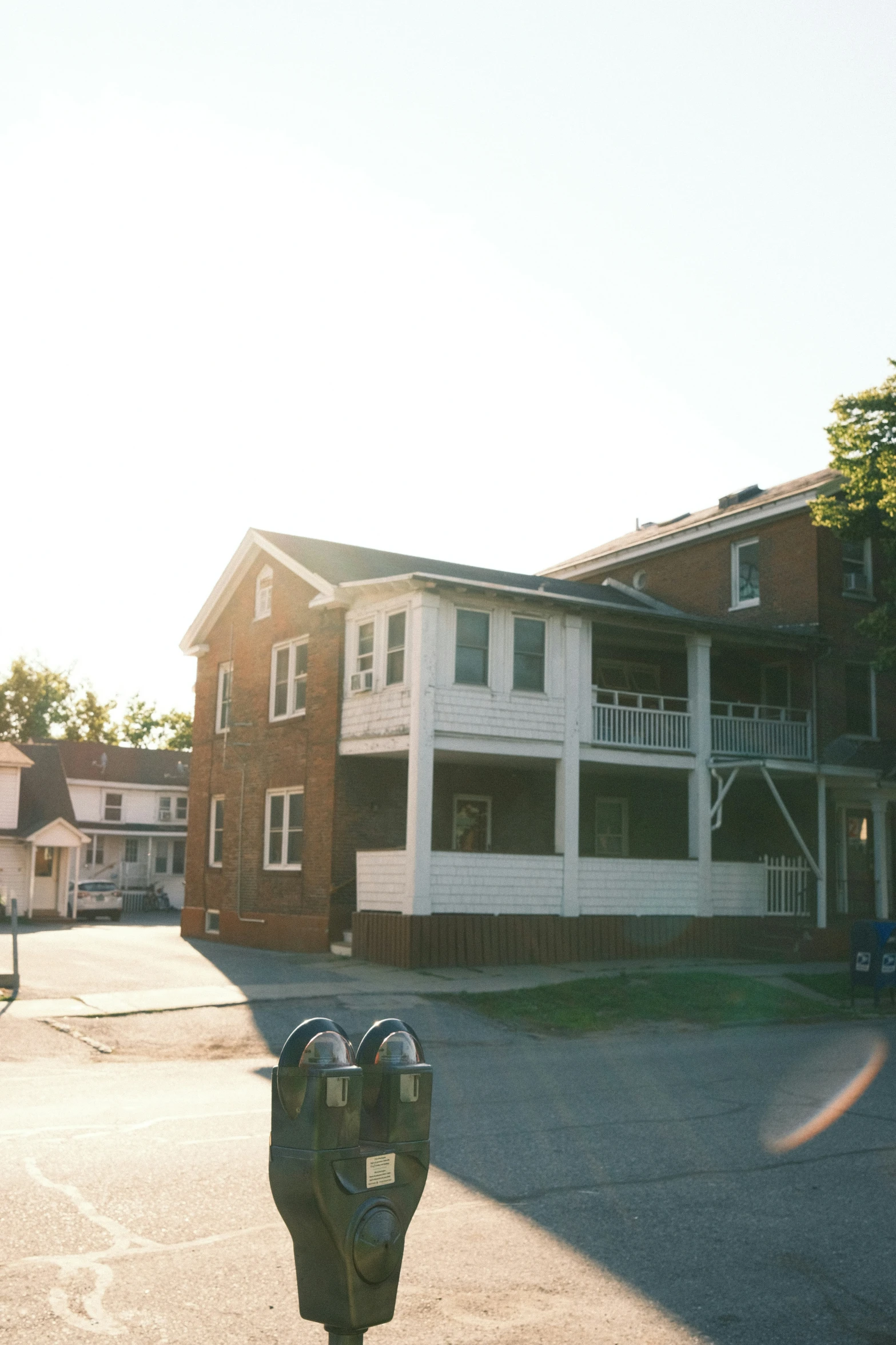 a large house on the corner of a lot