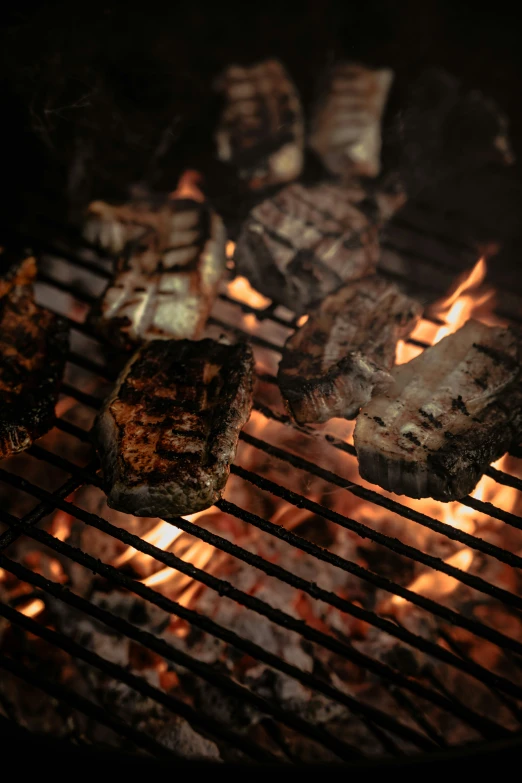 steak on the bbq with a little flame