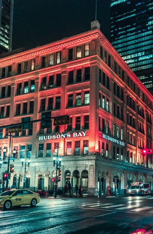 a large building that has a red light on it's side