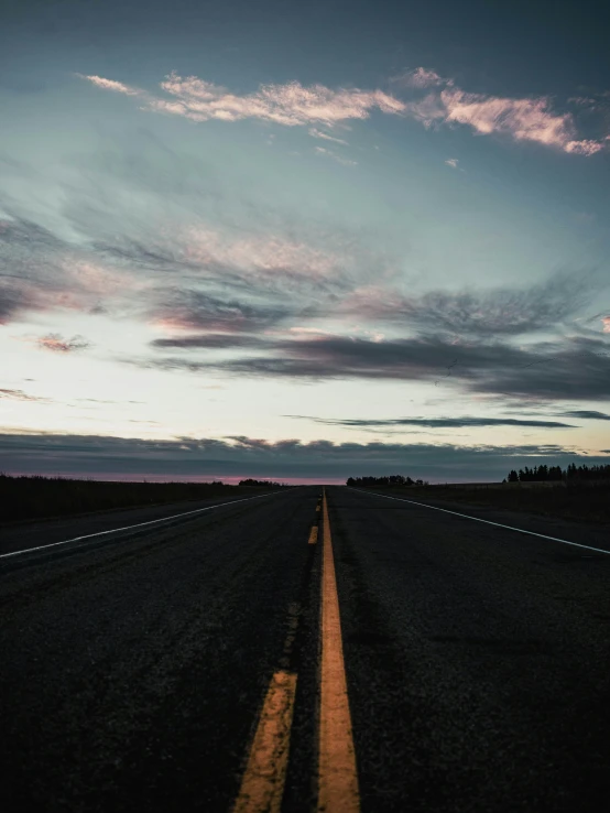 a long stretch of road stretching into the distance