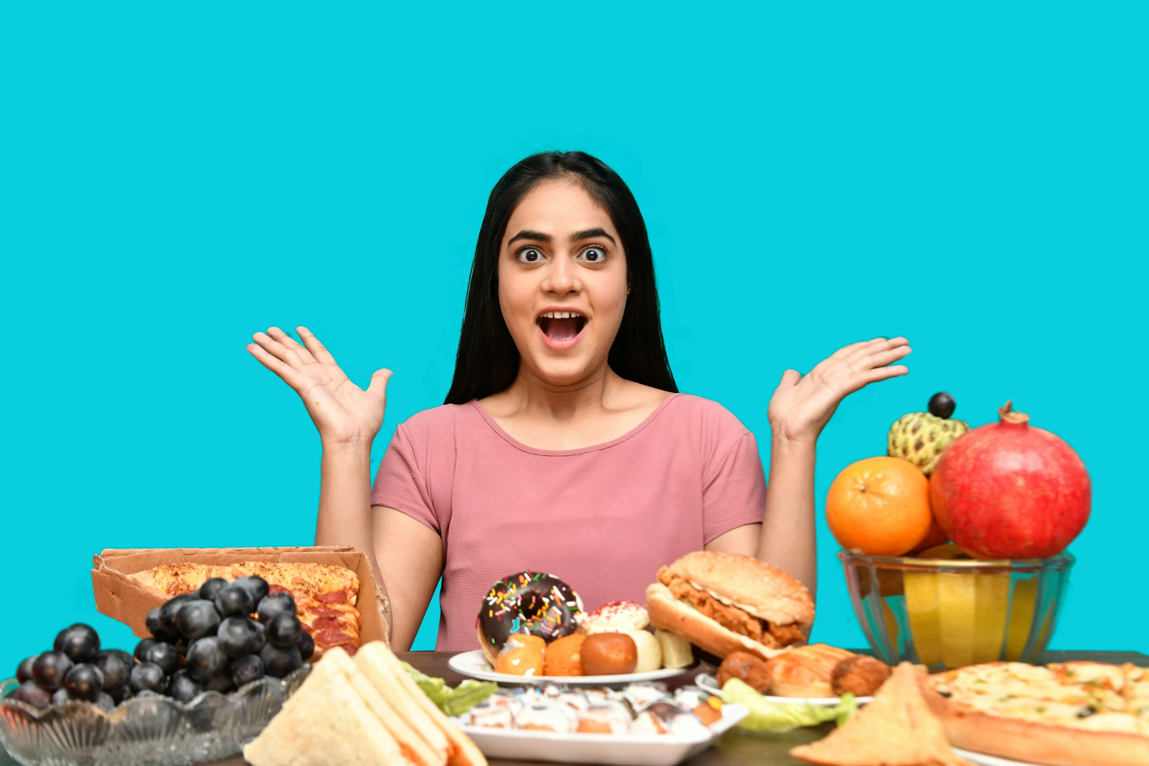 an image of a woman sitting in front of food