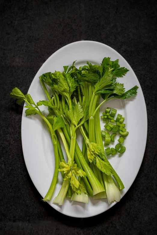 some veggies that are sitting on a plate