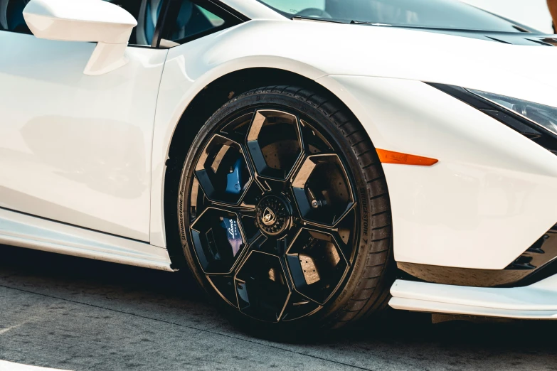 a white car parked on a city street