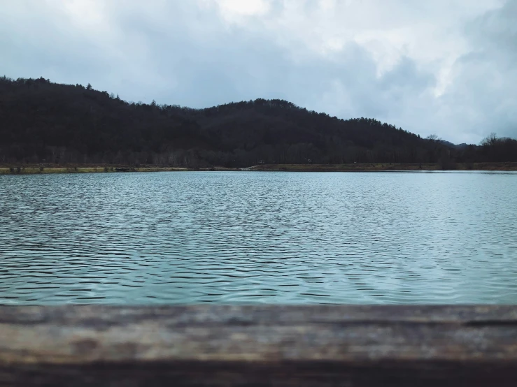 some very pretty water on a dark cloudy day