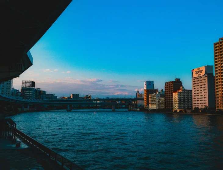 a body of water with buildings near by