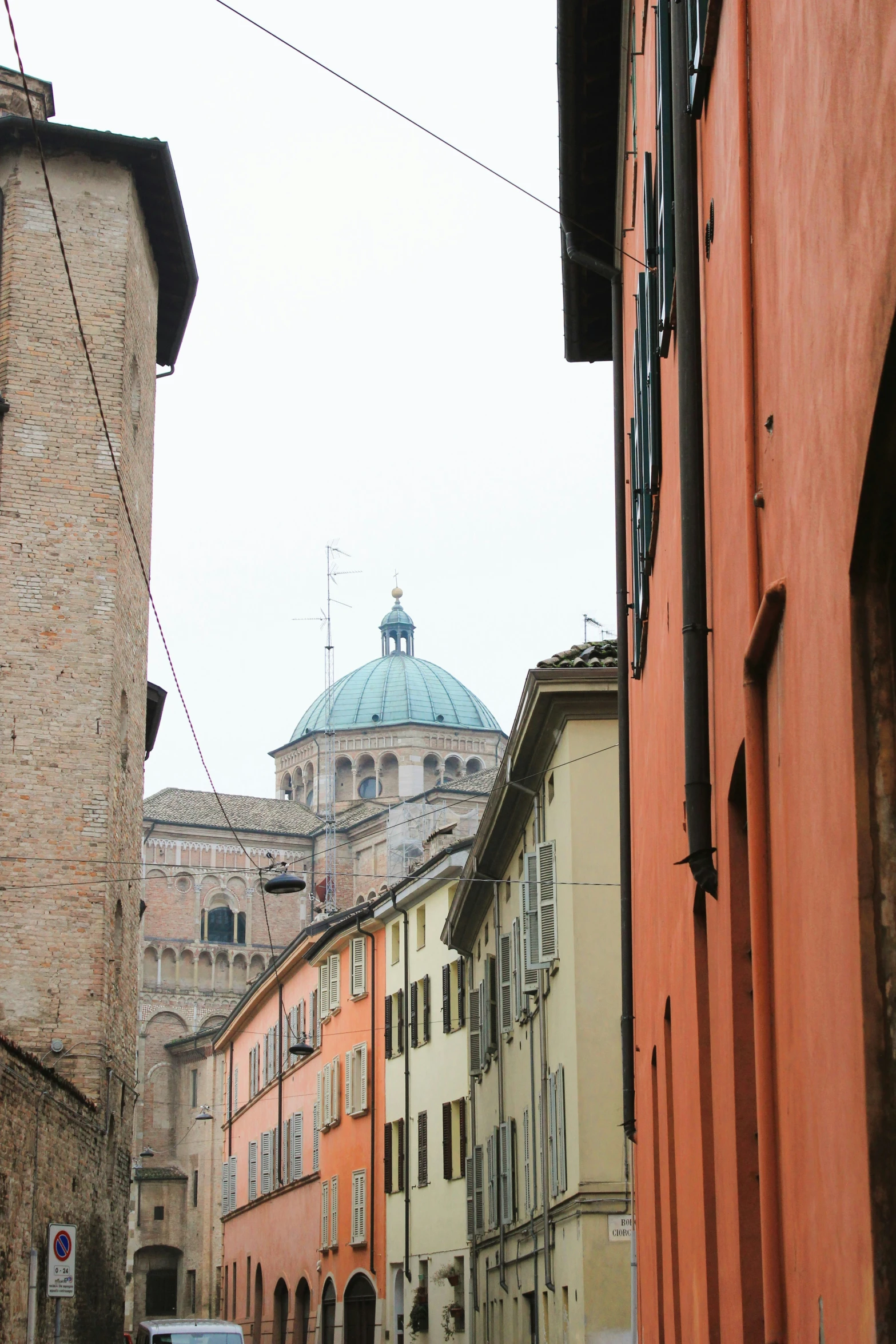 buildings along the street with a domed top in an old town