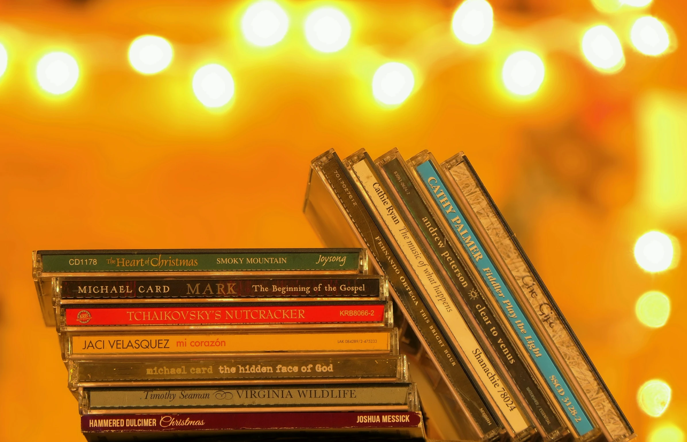 a stack of books with lights behind them