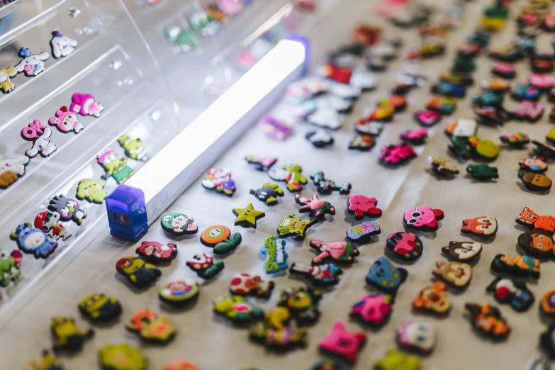 a case with some toy cars and magnets on it