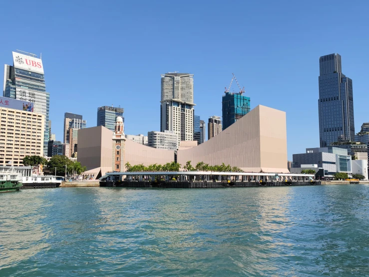 the waterfront with some tall buildings in the distance