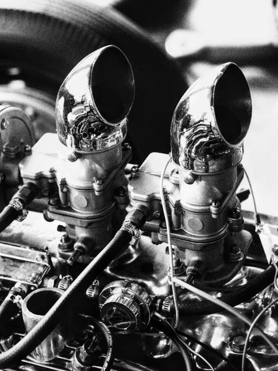 a silver two - speed car engine, from above