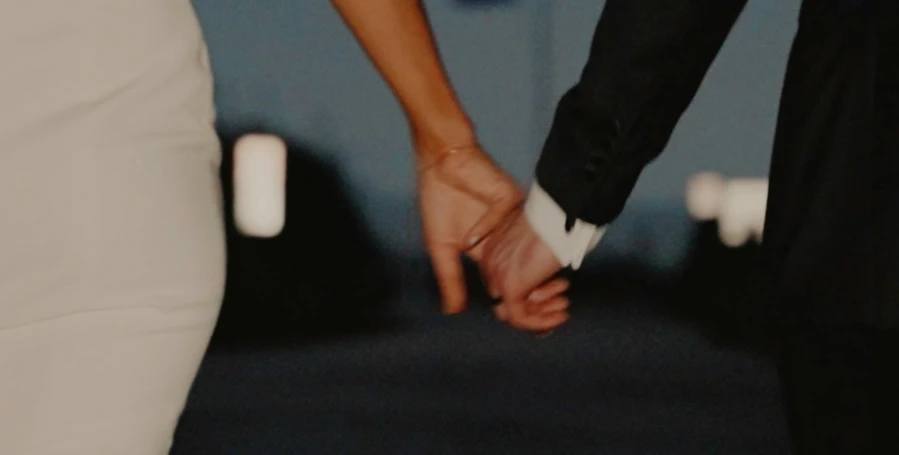 people are holding hands as they hold each other