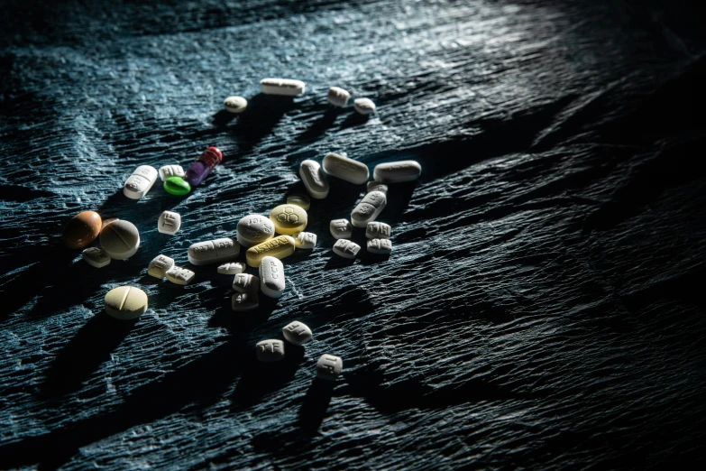 a table is covered in some tiny pills