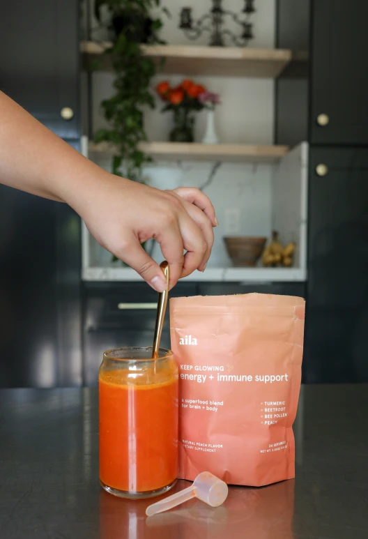 a bag of food is on a table with a blender