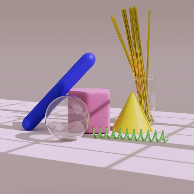 two straws, one blue and one pink are on the table