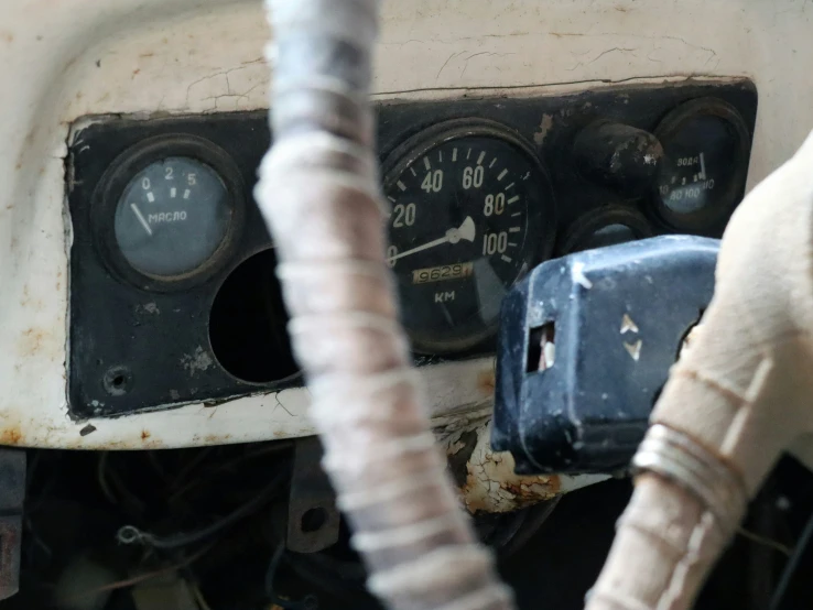 a close up of the dashboard and dash of an old car