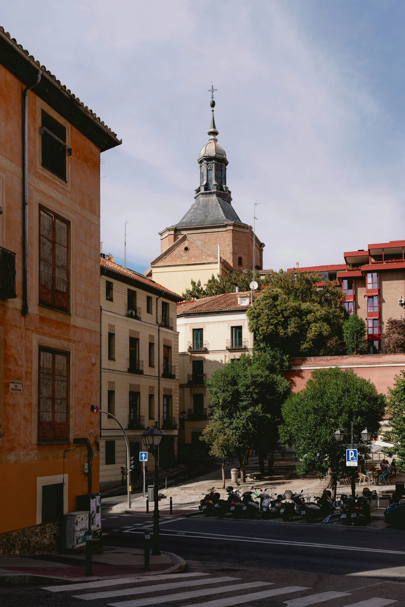 a city with buildings, and a tall tower