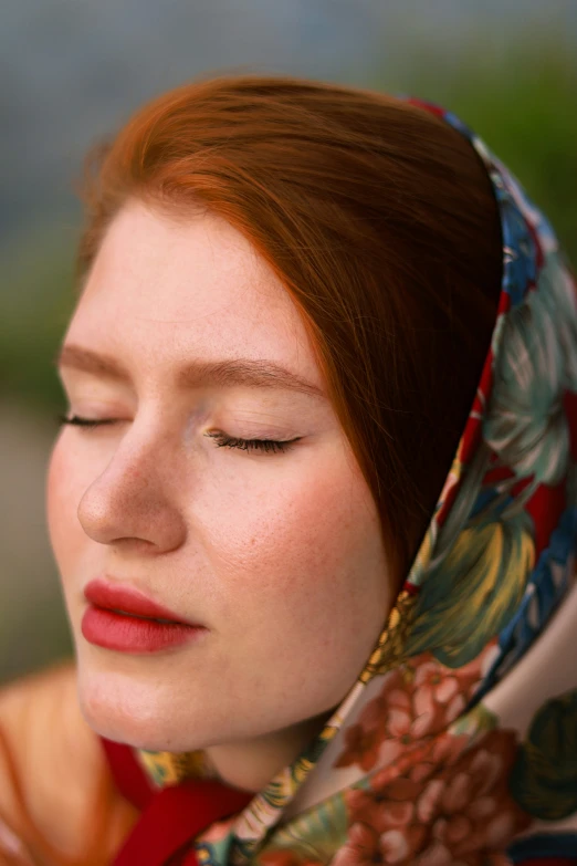 a close up of a person with a flower on it's head