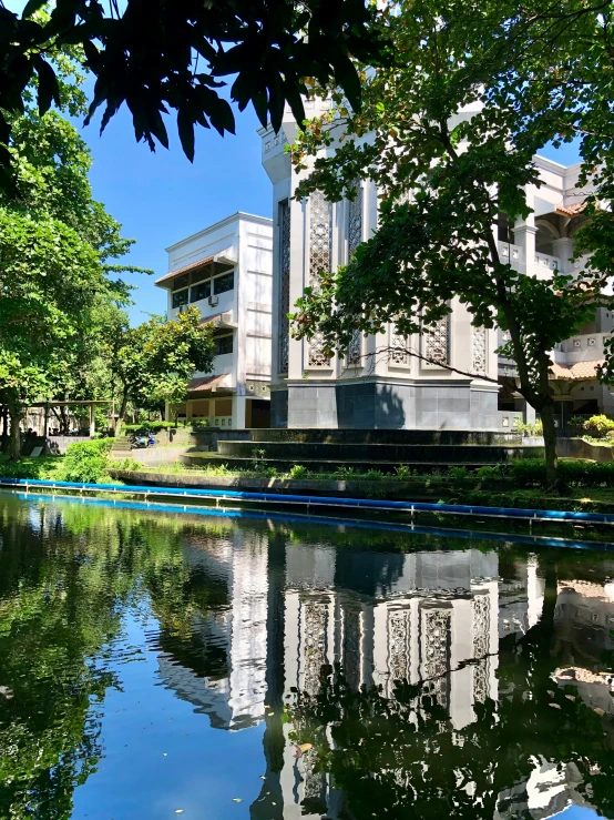 the water reflects the building's architecturally beautifully designs