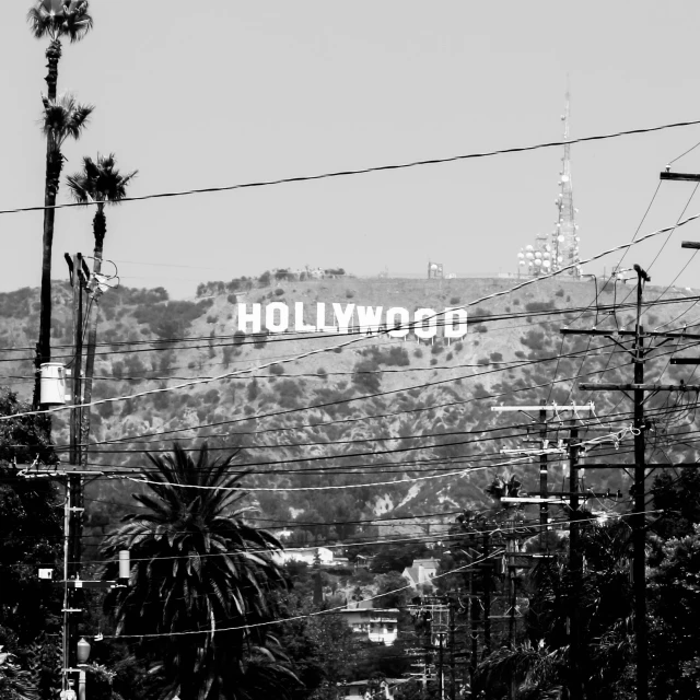 hollywood sign above the streets of los angeles