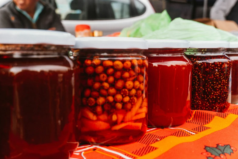 some jars with different kinds of items in them