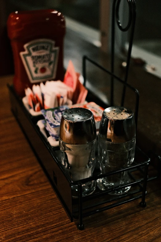 a couple of glass pitchers sit on a tray