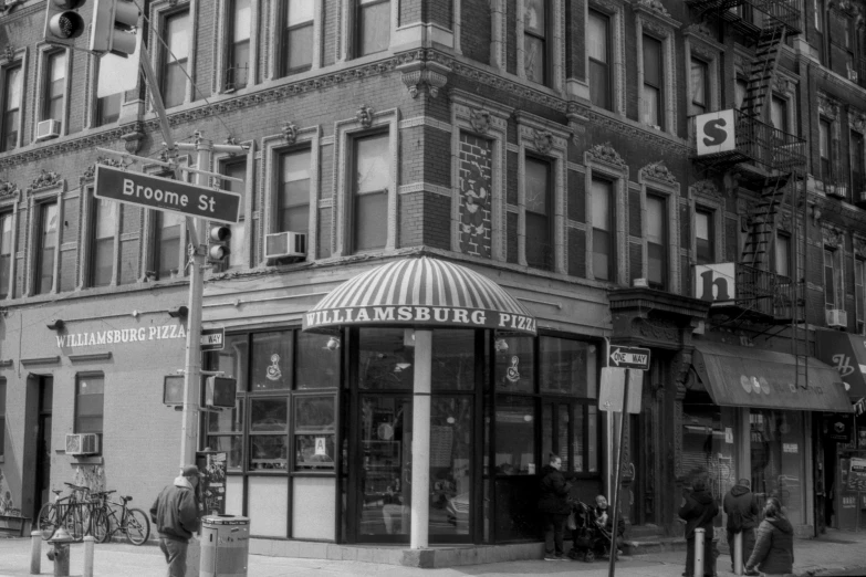 a building that has a bicycle rack at the corner