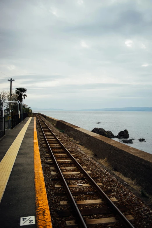 a train station on the edge of a beach