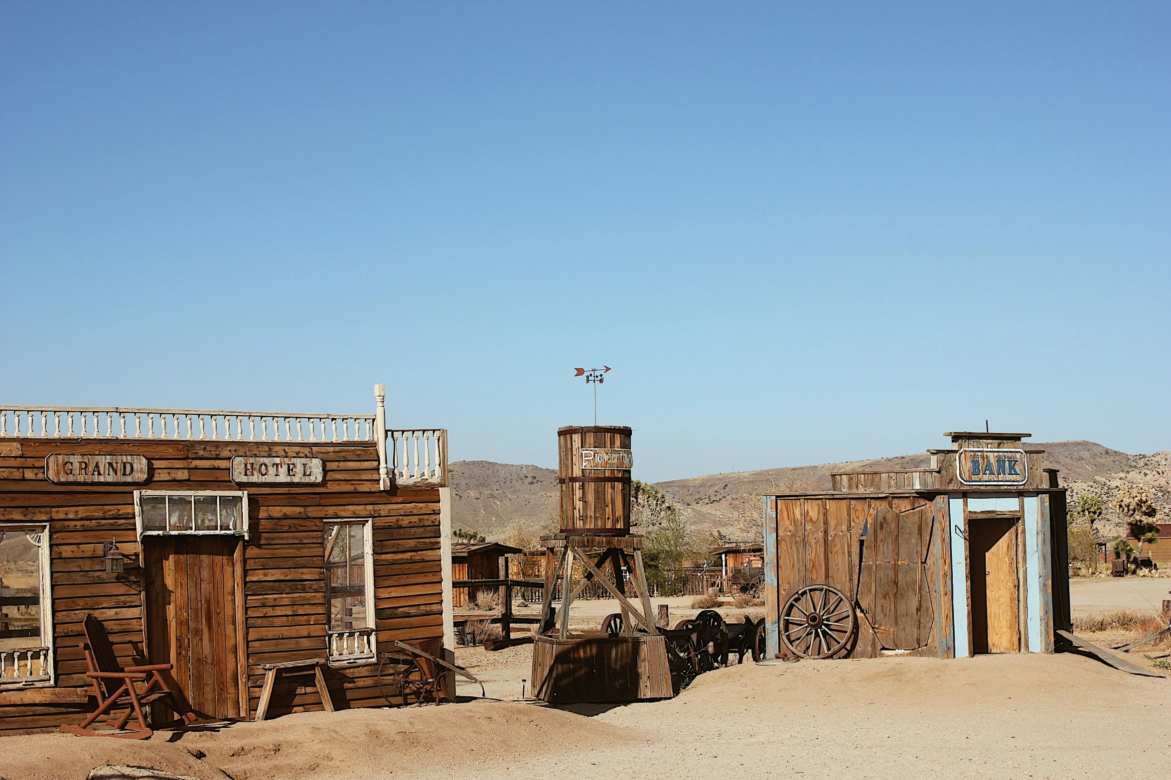 an old western western town with a weathered door and wooden building