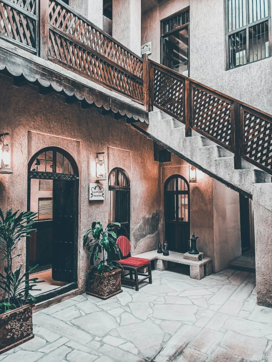 an indoor area with stairs and furniture