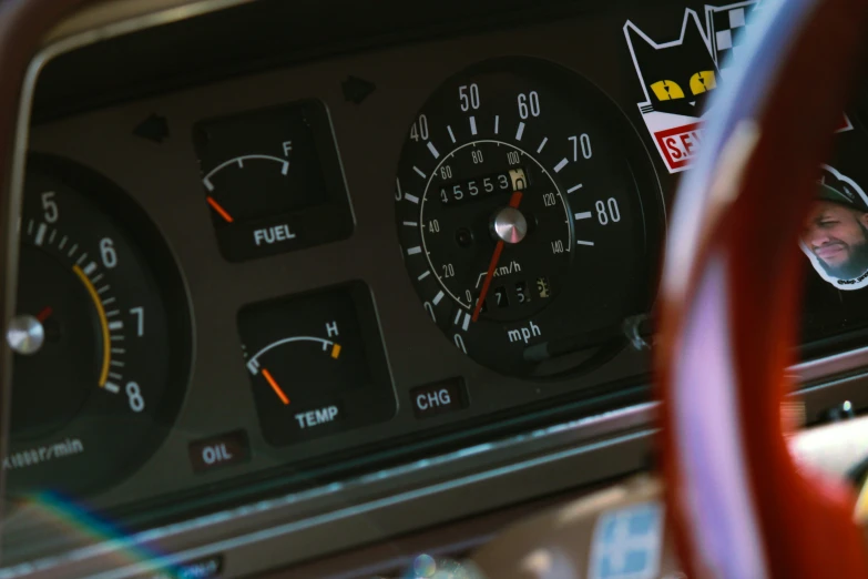 a close up of a gauge with a person