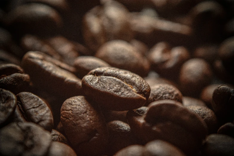 coffee beans are scattered on a coffee bean container