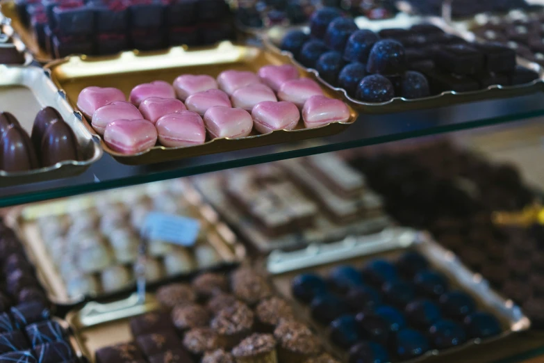 rows of different types and varieties of chocolate candies
