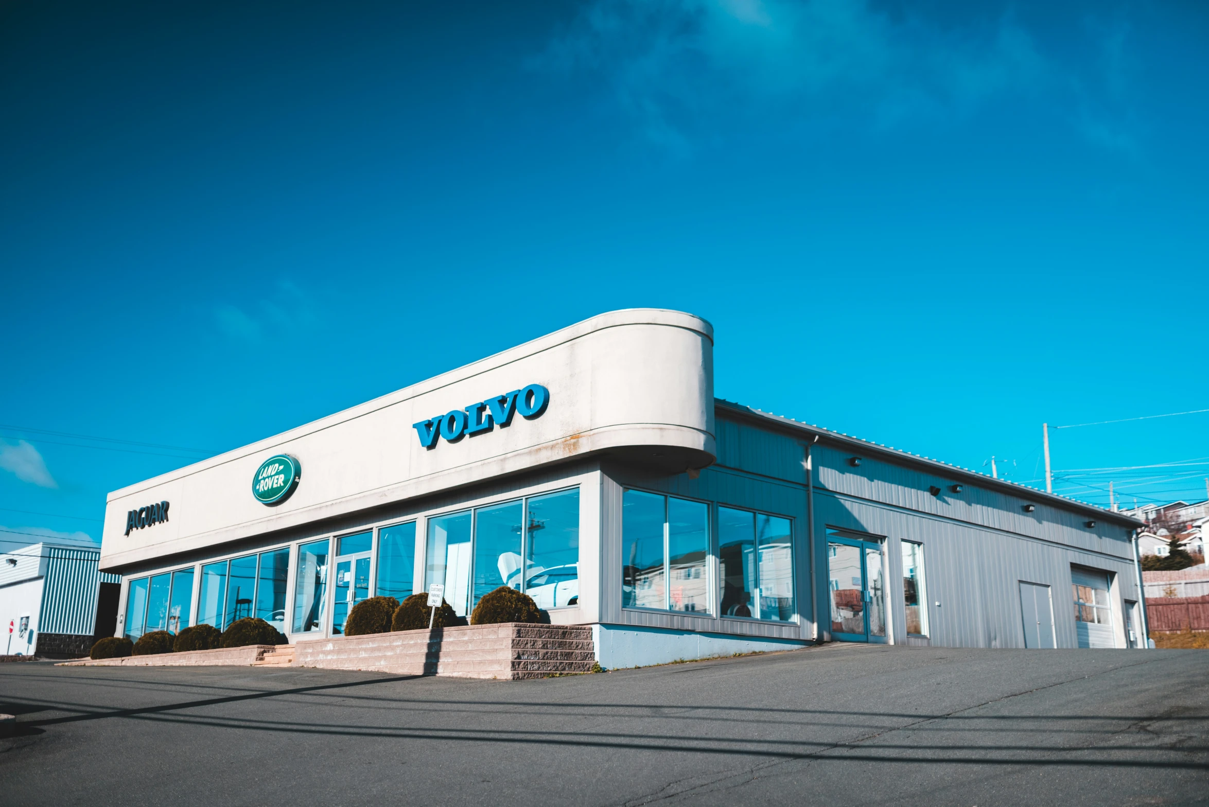 a volvo car repair shop is shown from the side