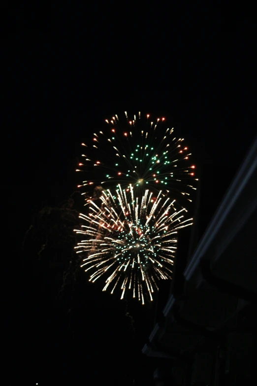 a fireworks display on a dark night sky